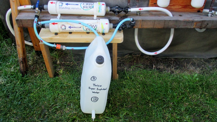 C:\Documents\GC\Dan's plant studies\E. Pak Choi - start approx Feb - April  2014\2. new plumbing (all AJ)\Photograph 5. Collection of Twice Super Imploded Water.JPG